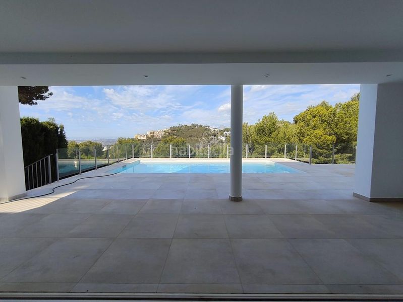 Foto c2211abd-1dde-4b88-bcea-e9dd6d0a7481. Xalet amb calefacció aparcament piscina a Altea hills Altea