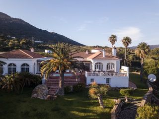 Chalet  Camino de la pista 3. Villa con piscina climatizada, vistas al mar y parcela de 8.830