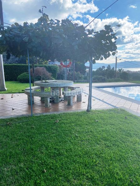 Foto d496f670-6fc8-4c70-ac19-079f20080d32. Lloguer xalet amb xemeneia calefacció aparcament piscina a Cangas