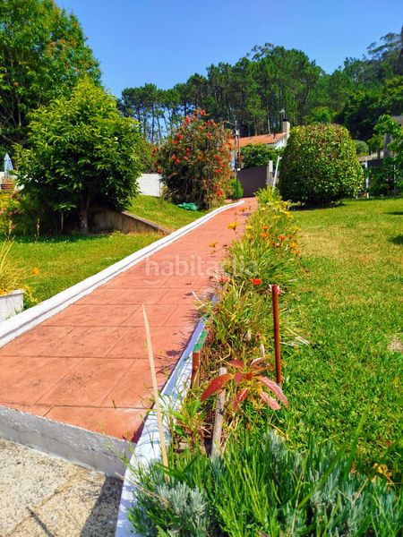 Foto 0d309173-41aa-497f-9b30-8cbf91675427. Xalet amb xemeneia calefacció aparcament piscina a Cangas