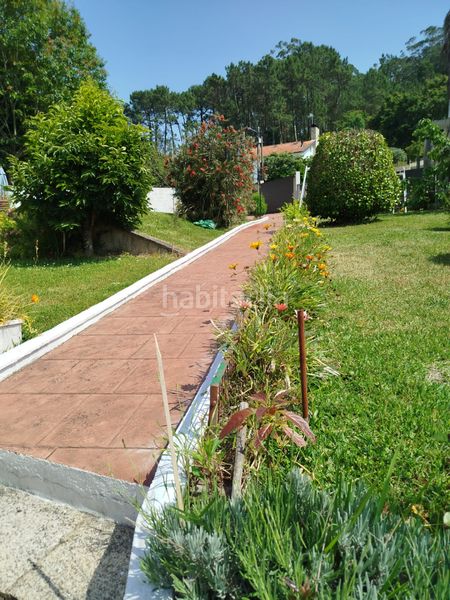 Foto da8658fa-bcc9-4c0e-ad73-72ec07e43894. Xalet amb xemeneia calefacció aparcament piscina a Cangas