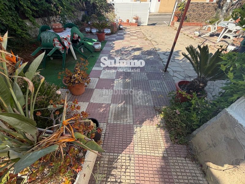 Foto af6fcd6b-73ee-46c1-87fc-9296fa6809fc. Casa amb calefacció aparcament piscina a Calafell park Calafell