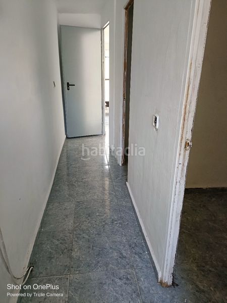 Foto c554ba47-98c3-4eb7-920f-9c18671ee791. Casa adossada a Entrevías Madrid