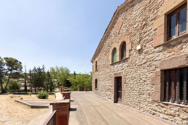 Foto f611aec1-1d1e-48b0-aeea-15a35eb71b6c. Masia amb aparcament a Moià