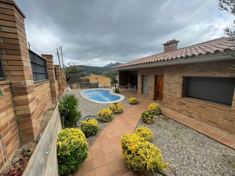 Foto 158c98fd-64f8-40f2-974d-803c0604cae0. Casa amb piscina a Arenys de Munt