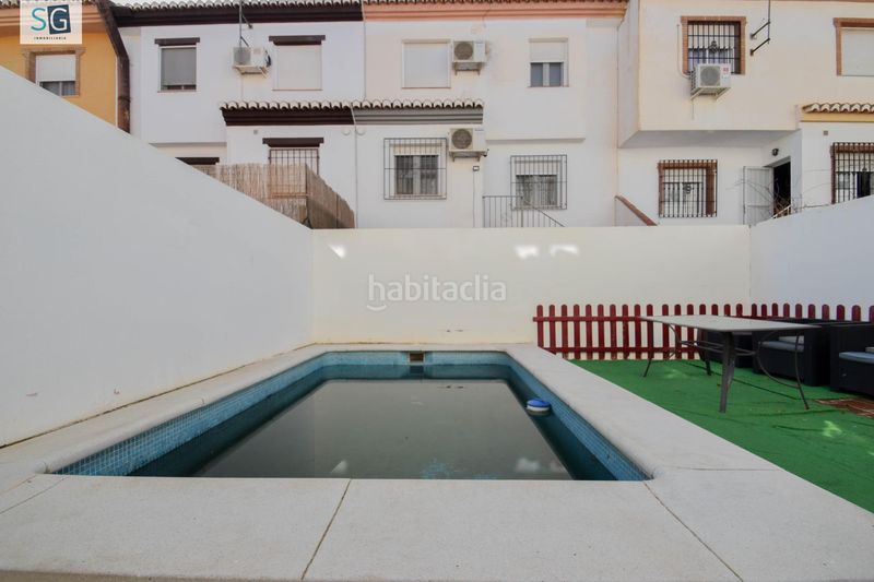 Foto 78c6e2cb-bf75-4b92-95fd-b68642faf9b9. Casa adossada amb piscina a Cúllar Vega