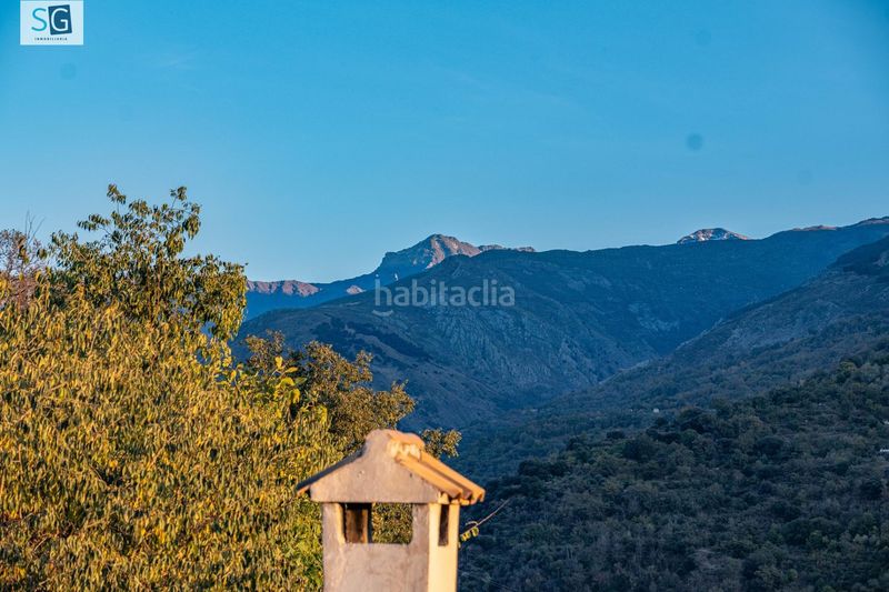 Foto 82e52f7e-003e-4e25-963b-41bca158fdff. Casa amb calefacció aparcament a Güéjar Sierra