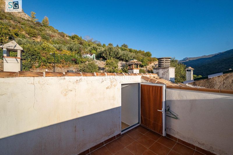 Foto f81cca4a-10b3-4155-9980-f6c7b31259a5. Casa amb calefacció aparcament a Güéjar Sierra