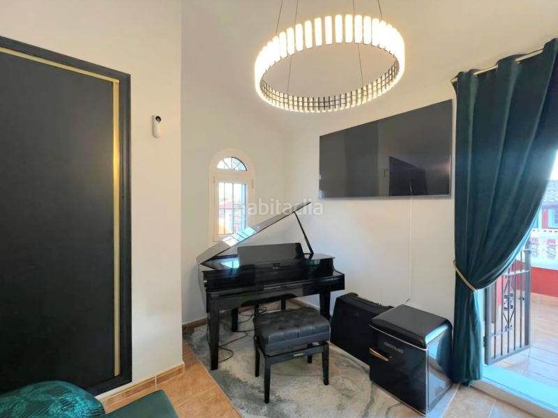 Foto c94a28fb-d138-45c5-8cd1-2a477933f80d. Casa adossada amb piscina a Los Almendros Orihuela