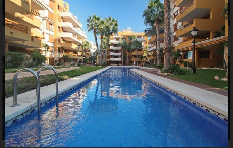 Foto 115daf46-a04f-43dd-ab3b-600a99d6b937. Apartament a Punta Prima Torrevieja