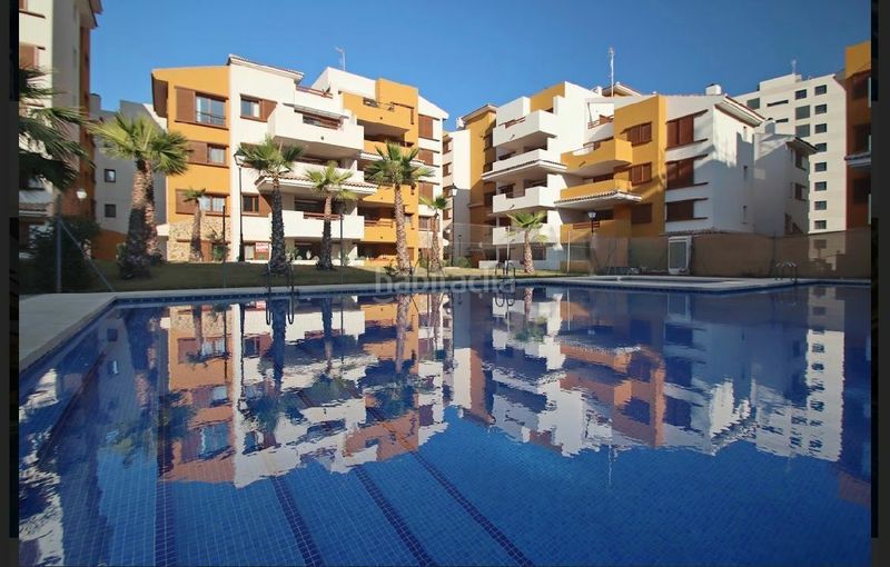 Foto 6187fc26-51f0-40d3-8423-265a16a54c00. Apartament a Punta Prima Torrevieja