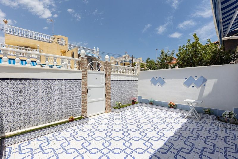 Foto 538191fb-7100-47d3-ae41-5ae9ff13fc1a. Casa adossada amb piscina a Cañada del Molino Torrevieja