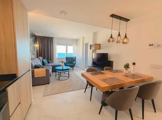 Apartament a Punta Prima. Apartamento moderno de dos dormitorios con vistas al mar en prim