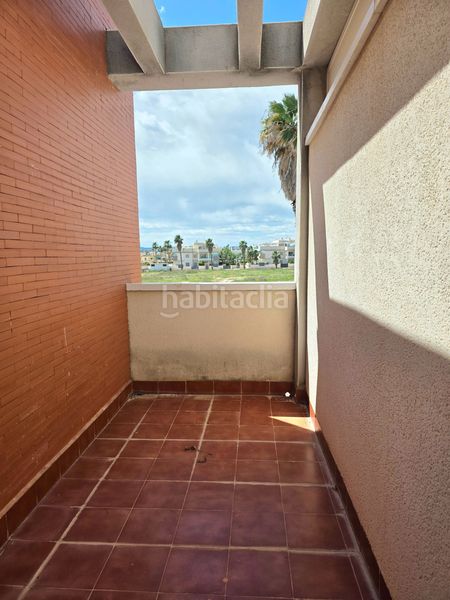 Foto 480e9a3d-b12f-4f01-8ae3-4a0dfd7a9e7a. Casa adossada amb piscina a Rojales
