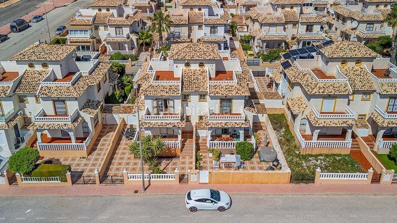 Foto 16ab3da5-b9df-47bf-85e4-fb370e709477. Casa adossada amb piscina a Lomas de Cabo Roig - Los Dolses Orihuela