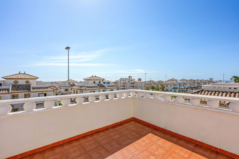 Foto fc4571e1-e96e-4584-9337-26f6f2303f17. Casa adossada amb piscina a Lomas de Cabo Roig - Los Dolses Orihuela