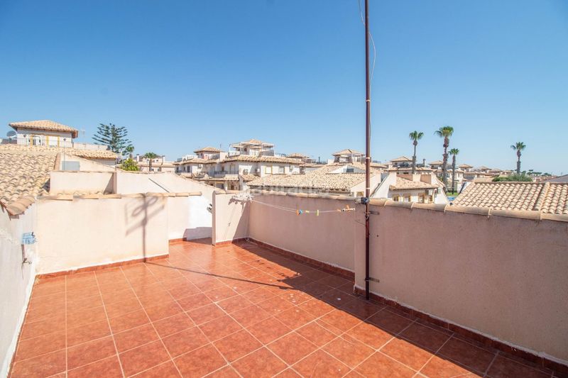 Foto f6ec7d29-d693-469d-a7e2-fd2fc4235a9e. Casa adossada amb piscina a La Regia Orihuela