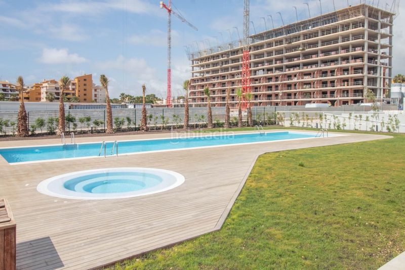 Foto c3ec2da6-8ceb-4bc3-8094-42f2d729d28c. Apartament amb calefacció piscina a Punta Prima Torrevieja