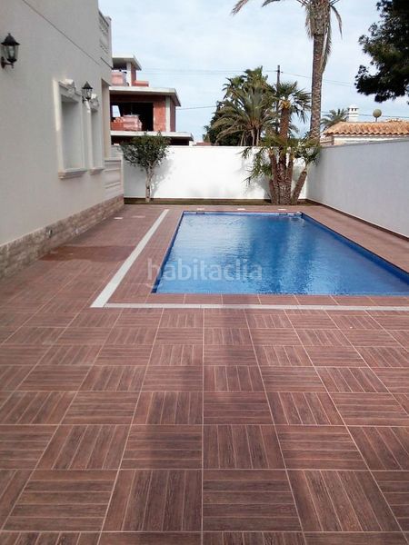Foto 265b902a-663c-44b7-b256-854c7f53f74f. Casa a Cabo Roig Orihuela