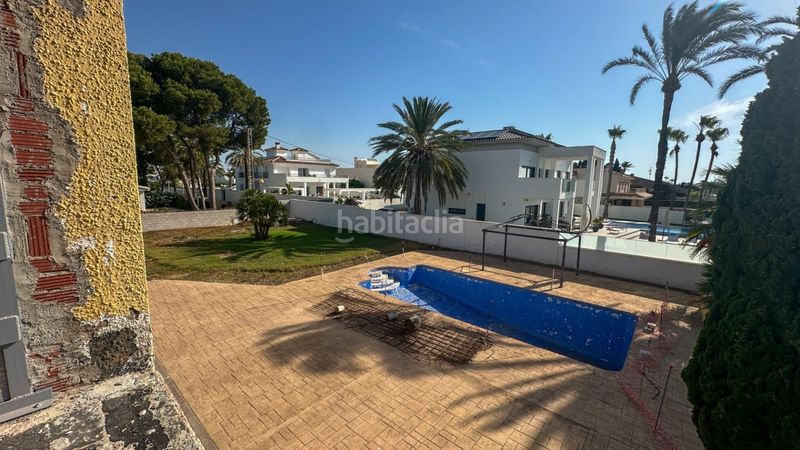 Foto 91f56025-14f9-4ac8-bfb9-fa1d89385b3d. Casa amb piscina a Cabo Roig Orihuela