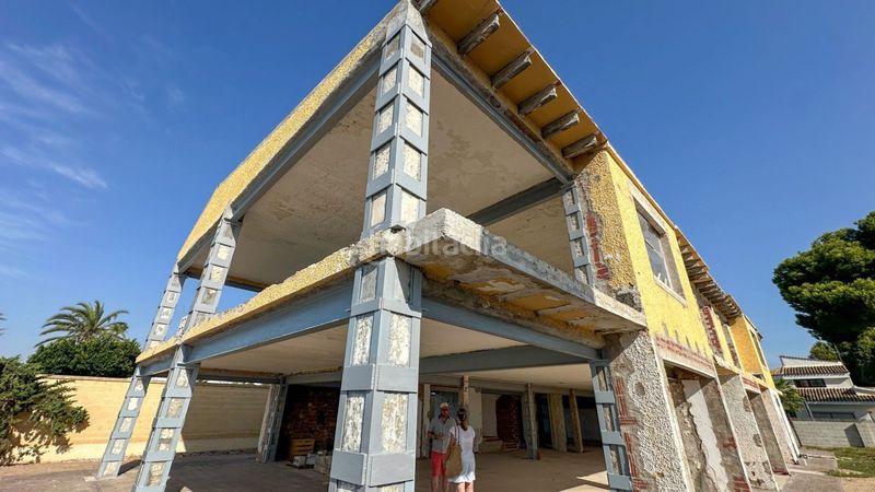 Foto f7d2a353-8b09-4d2e-97d0-dadb00c85088. Casa amb piscina a Cabo Roig Orihuela