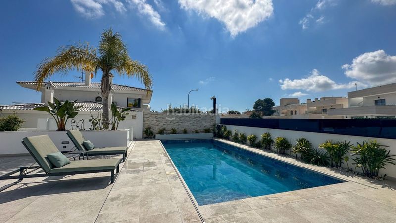 Foto 840e8e4b-8328-4ed6-9fa3-fd3d75015845. Casa amb calefacció a Cabo Roig Orihuela