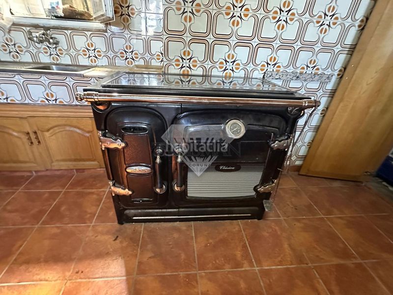 Foto fb2413b3-6103-4e1e-af58-cf1ca706b764. Casa amb aparcament a Agolada