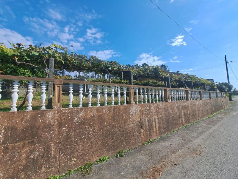 Foto 2d658b8b-9f90-41b9-9305-56caffedba4f. Casa amb aparcament a Rianxo