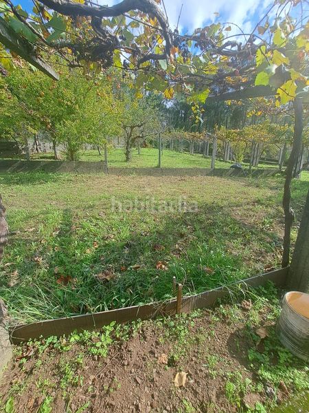 Foto 307deb09-e71e-40ad-b6a8-c250e7fec57a. Casa amb aparcament a Rianxo