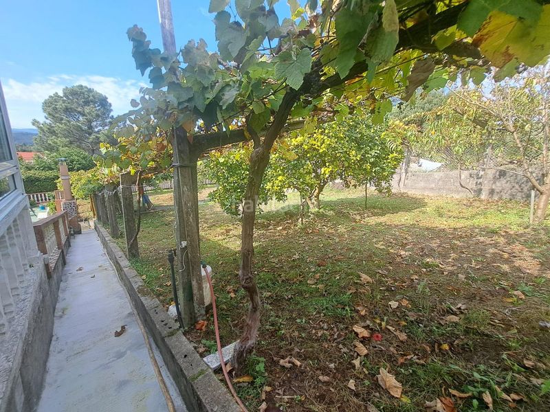 Foto 65d316ee-f8da-4d21-beb2-05d7e719b024. Casa amb aparcament a Rianxo