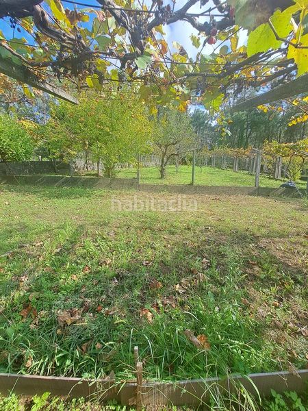 Foto e9ed9e4a-db8e-4696-8053-fc65787bede1. Casa amb aparcament a Rianxo