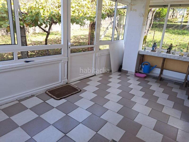 Foto f3f66626-f75f-4f70-9dc9-025af4c8d2e7. Casa amb aparcament a Rianxo