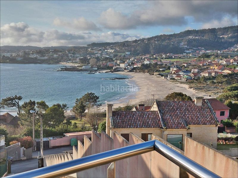 Foto ab81c087-f5af-48f5-9120-6f7b632eb32a. Casa amb aparcament a Dorrón Sanxenxo