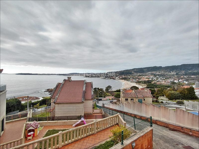 Foto b01b55a7-c5eb-44ac-8e26-da1c3540db78. Casa amb aparcament a Dorrón Sanxenxo
