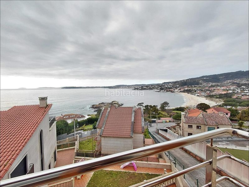 Foto c0ef2442-ad75-4bbc-84d6-db0d69488631. Casa amb aparcament a Dorrón Sanxenxo