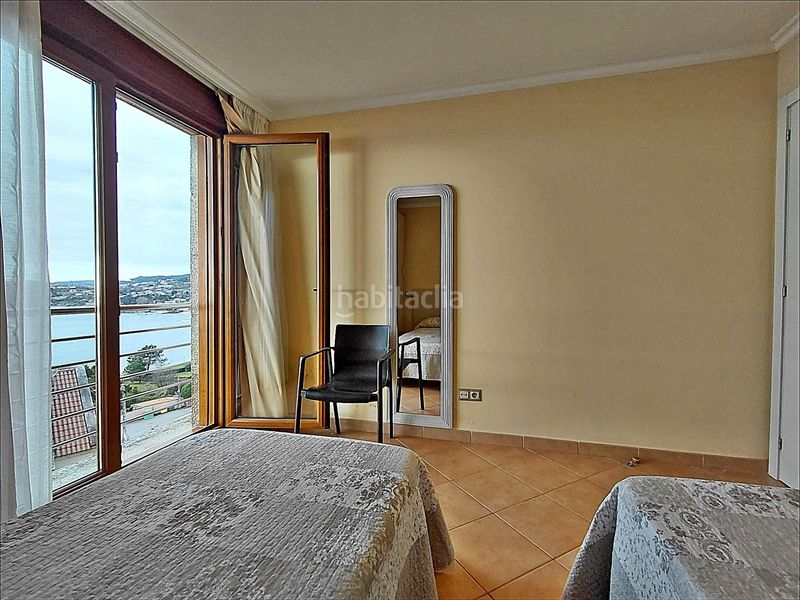 Foto c51a2bba-55b0-476f-a13d-d189ae930f2c. Casa amb aparcament a Dorrón Sanxenxo