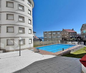 Flat  Calle calle cesteiros. Piso con piscina en sanxenxo centro 2 dormitorios, 1 baño, cocin