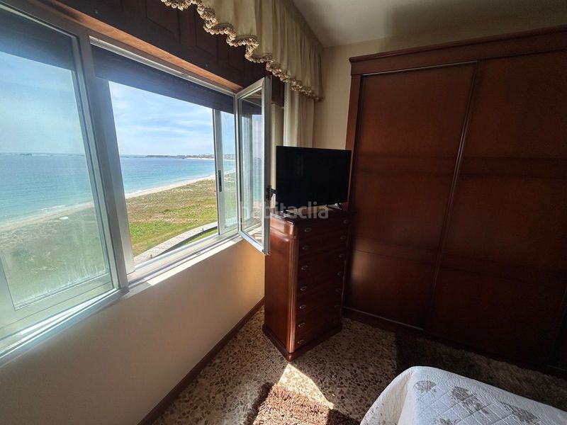 Foto 825e0dd4-48b5-4f92-bee0-115c682f307b. Piso  con vistas al mar en Castiñeiras a 30 metros de la playa en Ribeira