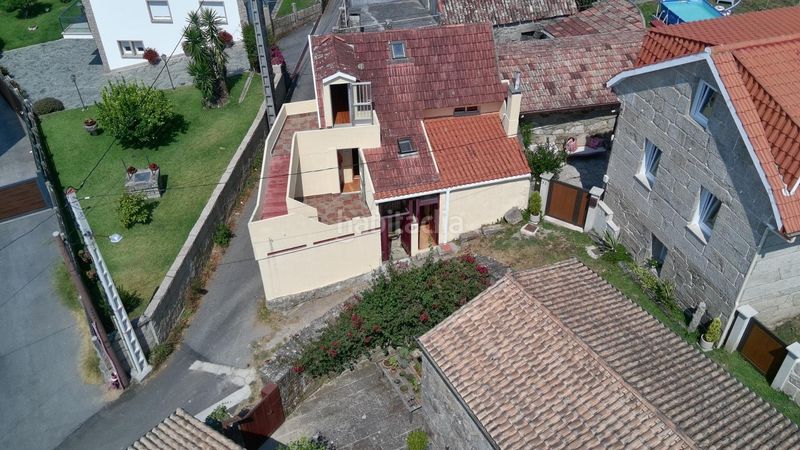 Foto b3d5bfe2-6f6d-4b9b-a2cc-57b4365a50cc. Casa amb calefacció a Sanxenxo pueblo Sanxenxo