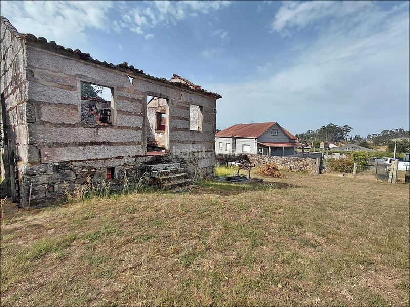Foto 41f1a2bf-c190-4e46-8646-ce1a5fba5bff. Casa amb aparcament a Cea Vilagarcía de Arousa