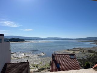 Appartement à Grove (O). Ático con vistas al mar y terraza