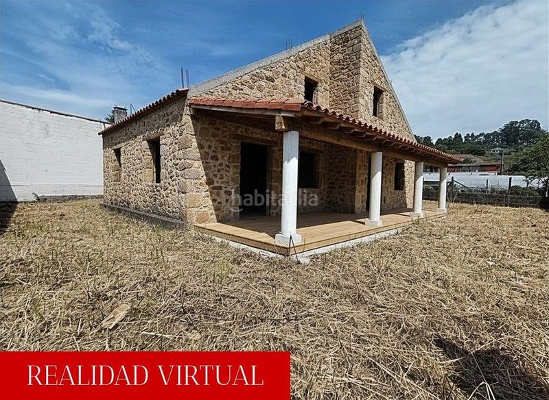 Foto 100a6cdd-d0dd-4965-a5d8-049bfd5456d8. Casa amb aparcament a Catoira