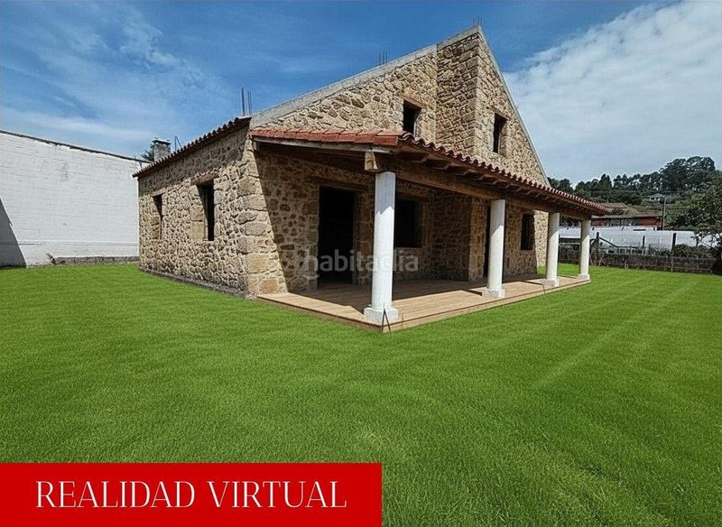 Foto ef6552cb-fb6c-4fa3-a821-9d79568666b4. Casa amb aparcament a Catoira