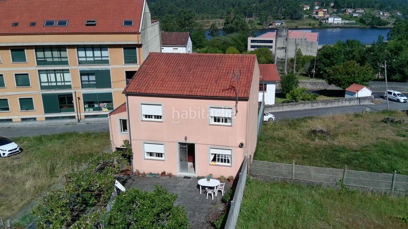 Foto 18c88335-5f02-438e-a672-053ef22dda55. Casa amb calefacció aparcament a Catoira