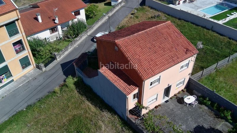 Foto 576f4f48-4e09-47e7-93d3-4bbc17732f0f. Casa amb calefacció aparcament a Catoira