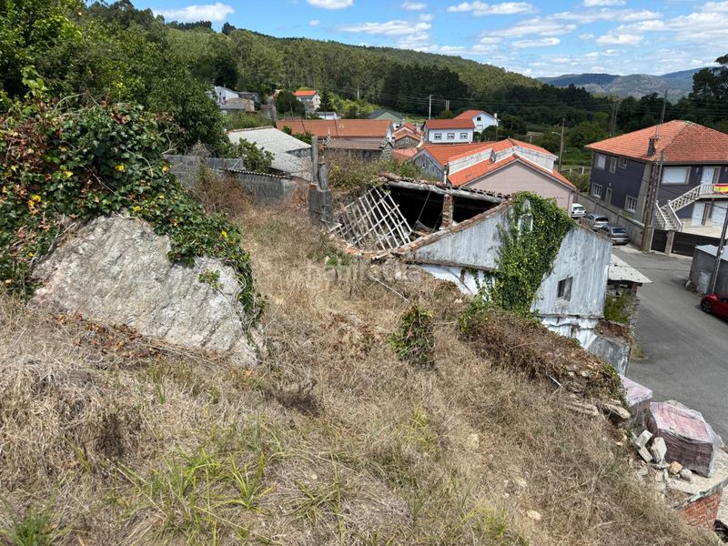 Foto 4a0d5900-8d33-40bf-9e38-71c661bda0d9. Casa  con terreno para restaurar en Boiro