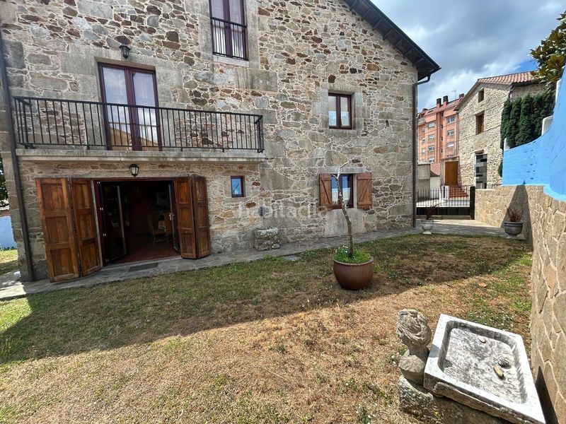 Foto 1e493cce-2150-4e63-b605-f35749436c79. Casa amb calefacció aparcament a Boiro