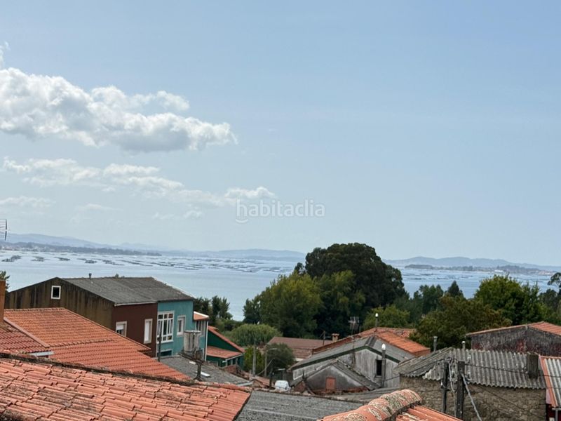 Foto 77067a67-e021-4a40-9dea-c29442568a1b. Casa adossada a Boiro