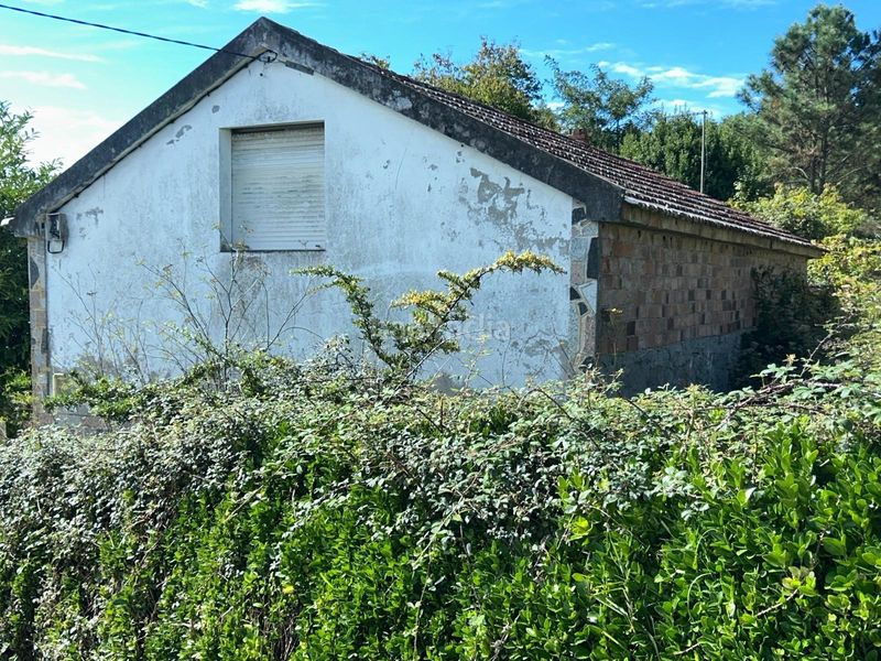 Foto 3924f48f-146b-4d06-951d-942c5fe4bbc1. Casa a Olveira Ribeira