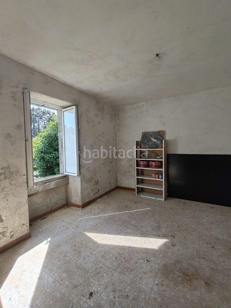 Foto ba9c905b-ad4d-4482-bc7e-b9ede2ce2459. Casa a Rianxo